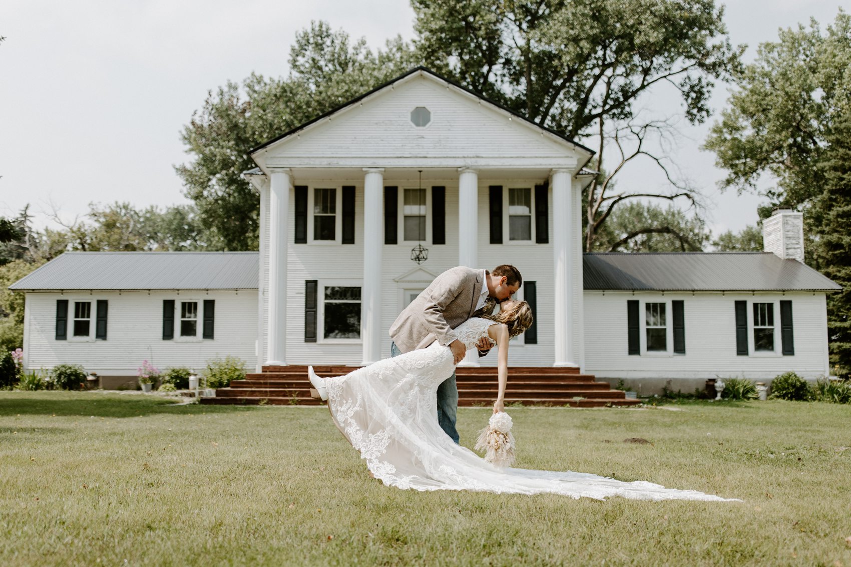 We took photos of the bride and groom around the venue at Prairie Meadows.