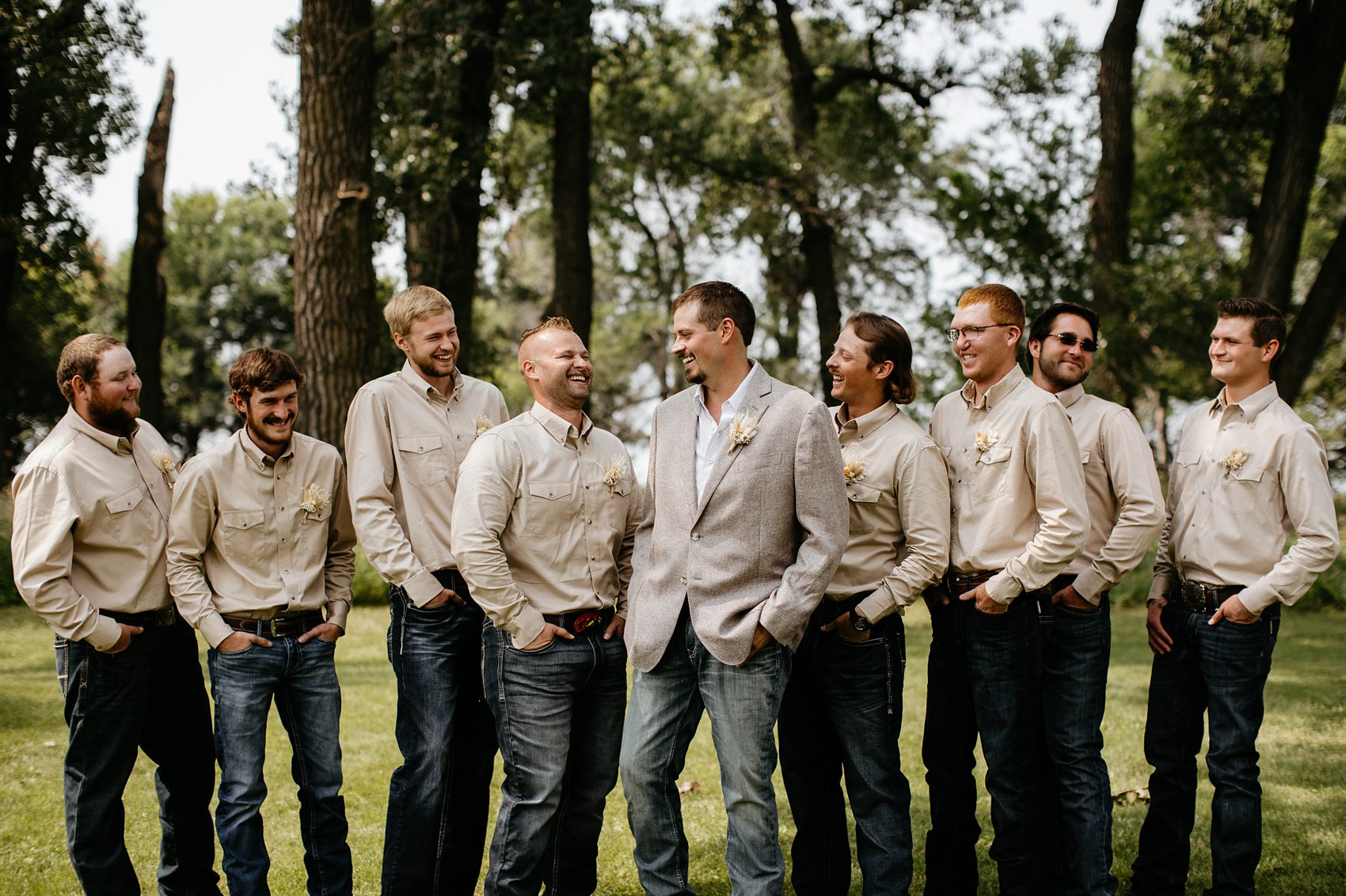 The wedding party was the perfect mix of boho and western for this Prairie Meadows Venue wedding.