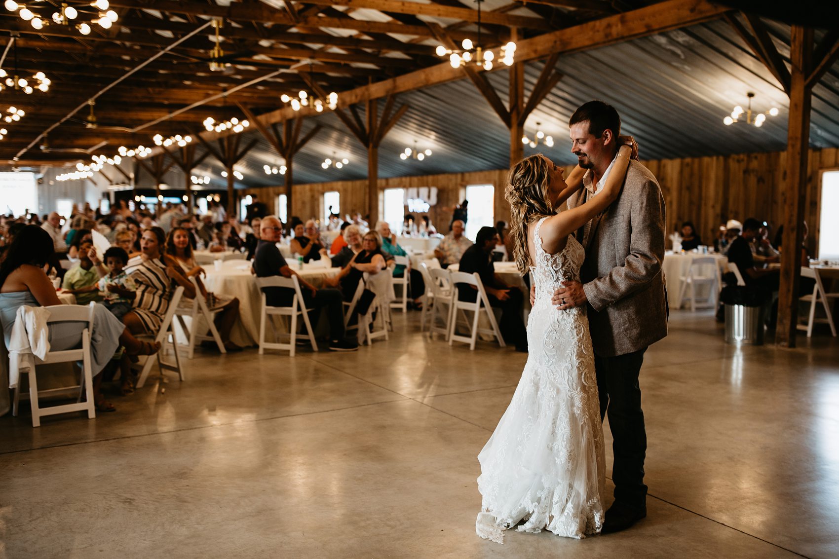 The bride and groom's first dances at Prairie Meadows Wedding Venue